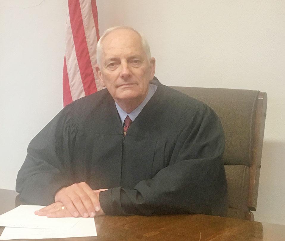 State s longest serving district court judge retires Grant Tribune